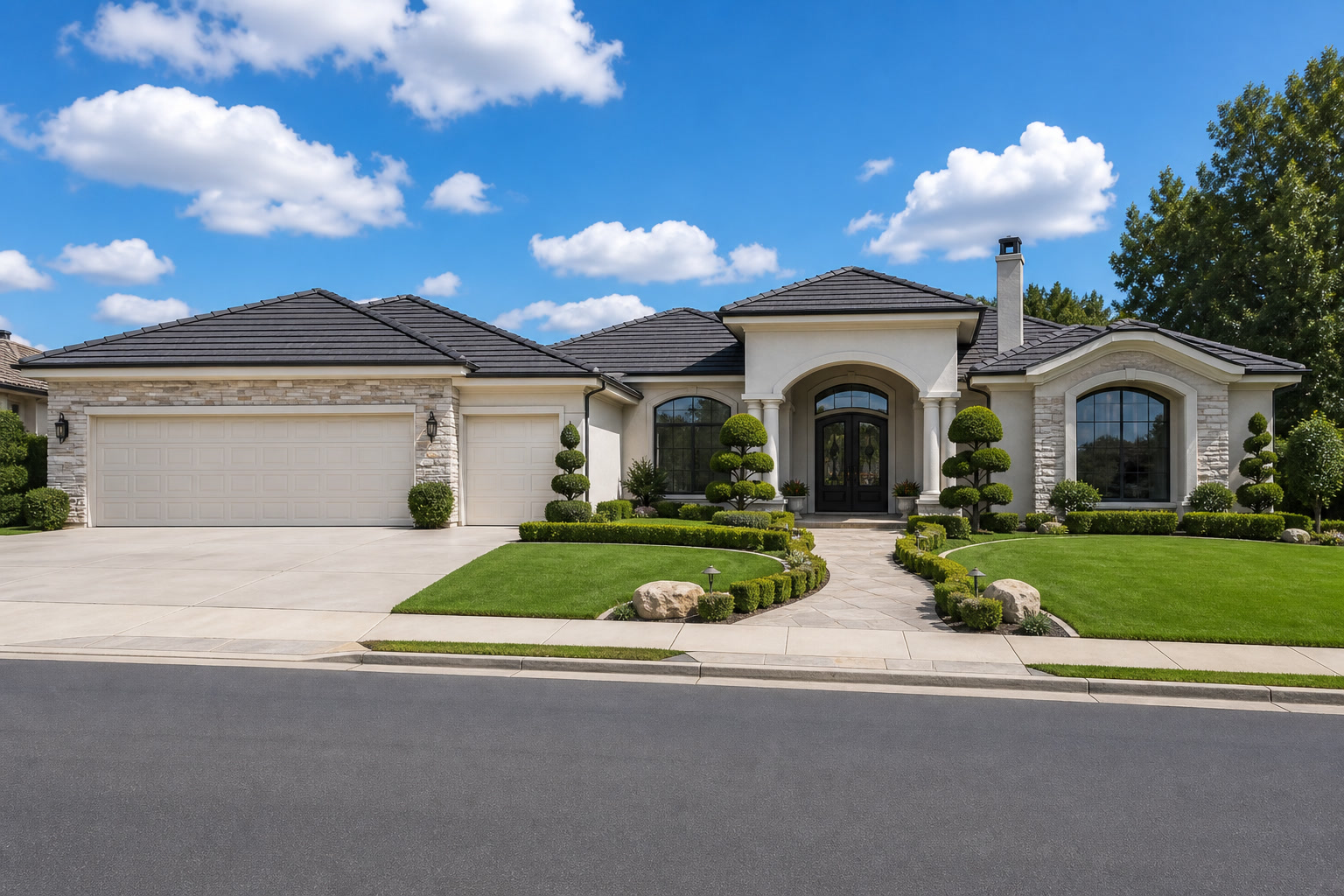 Mediterranean ranch home with stacked stone, an arched entry, and formal landscaping